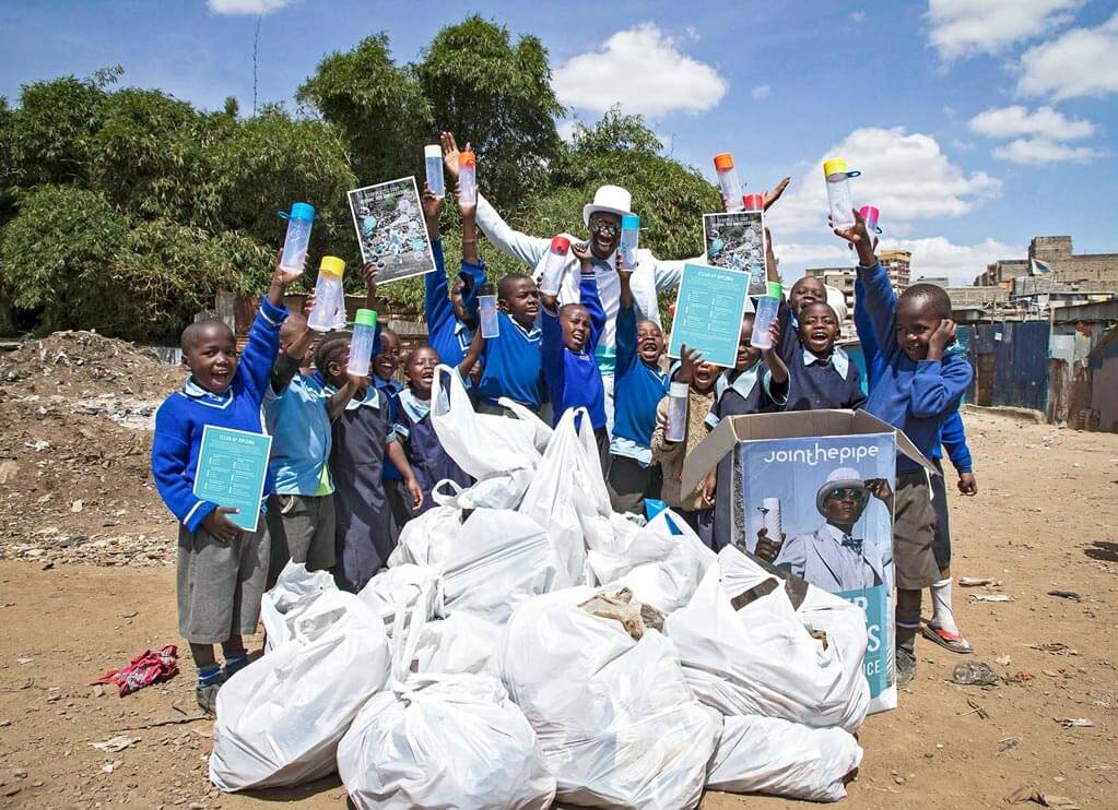 join the pipe - kids receiving gifts