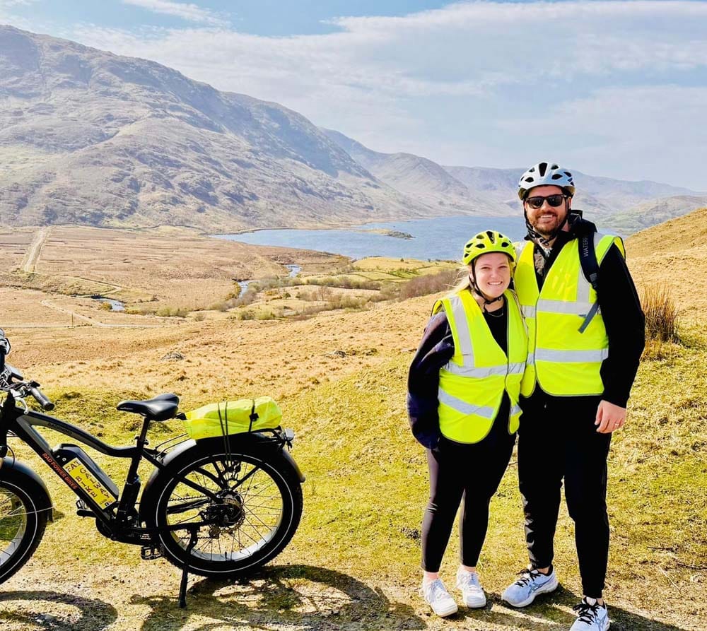 couples tour - man and woman with bike in Galway
